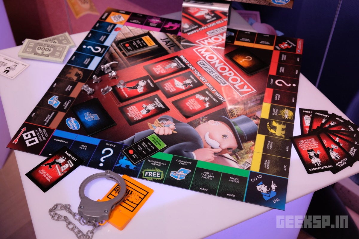 Monopoly Cheaters Edition comes with handcuffs 1