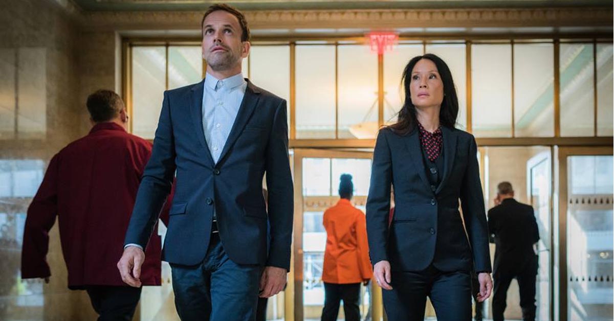 Jonny Lee Miller as Sherlock Holmes as Lucy Liu as Joan Watson