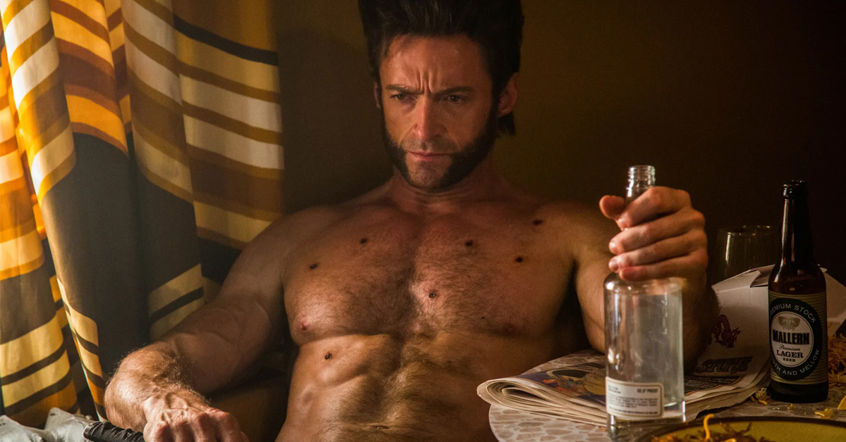 Shirtless Hugh Jackman as Wolverine holding a bottle of alcohol | The character will appear in Deadpool 3