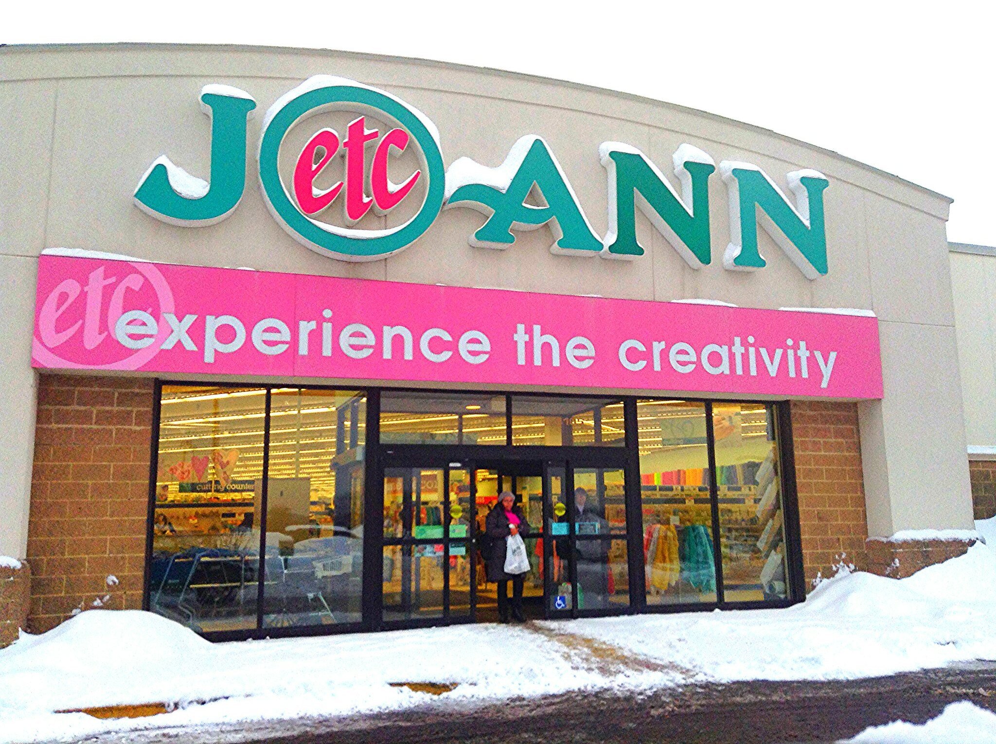 Jo-Ann Store storefront covered in winter snow