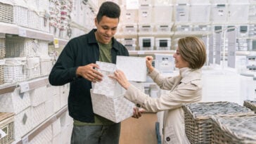 Man and woman shopping for homeware. Find out which U.S. retailers won't likely survive a recession.