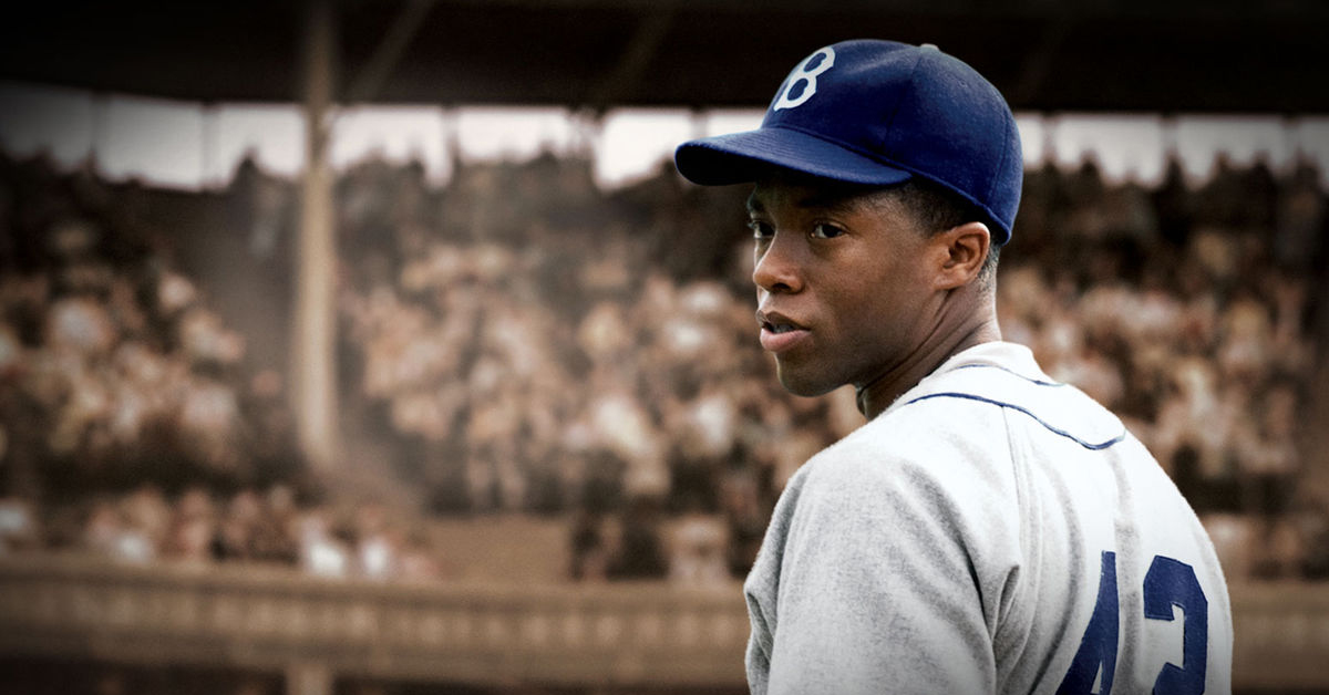 Chadwick Boseman as Jackie Robinson in 42
