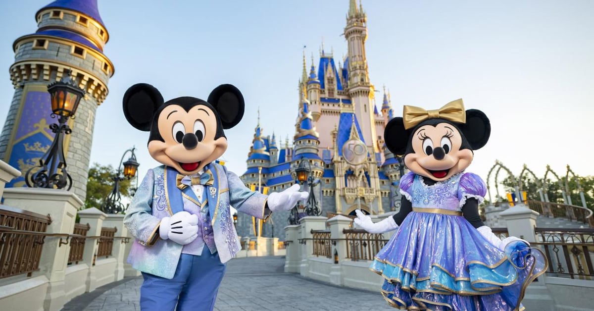 Mickey Mouse and Minnie Mouse welcoming guests at Disney World in Orlando, Florida
