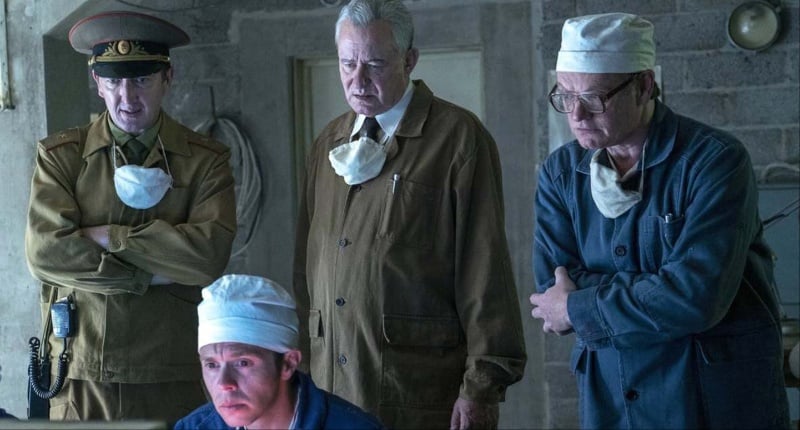 Bill Skarsgard and his co-stars in a still from Chernobyl