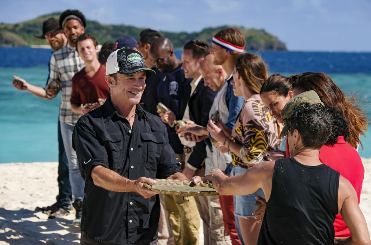 Amber Mariano, Jeff Probst, Danni Boatwright, Yul Kwon, Tyson Apostol, Denise Stapley, Tony Vlachos, Jeremy Collins, Adam Klein, Ben Driebergen, and Wendell Holland in Survivor (2000) | ©Image Credit: CBS