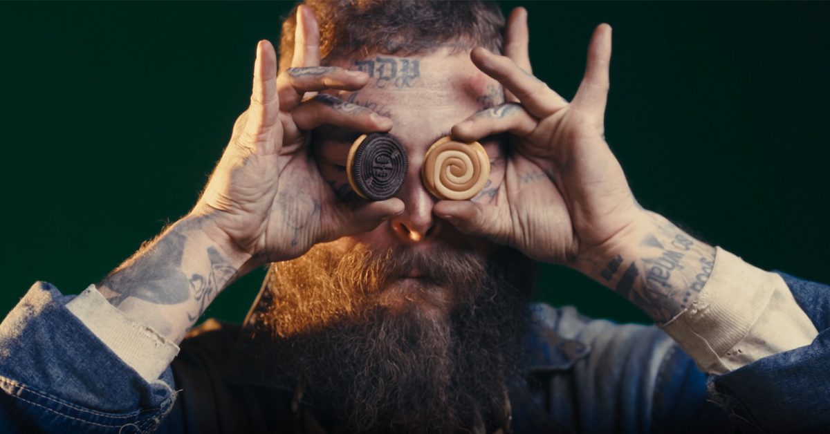Post Malone showing off his collaborative cookies with Oreo | ©Image Credit: Mondelēz International
