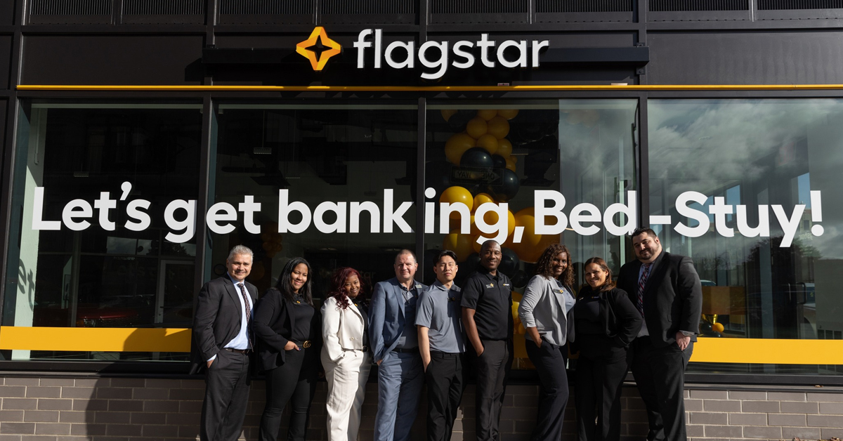 Flagstar Bank employees outside one of its branches | ©Image Credit: Flagstar Bank/Facebook