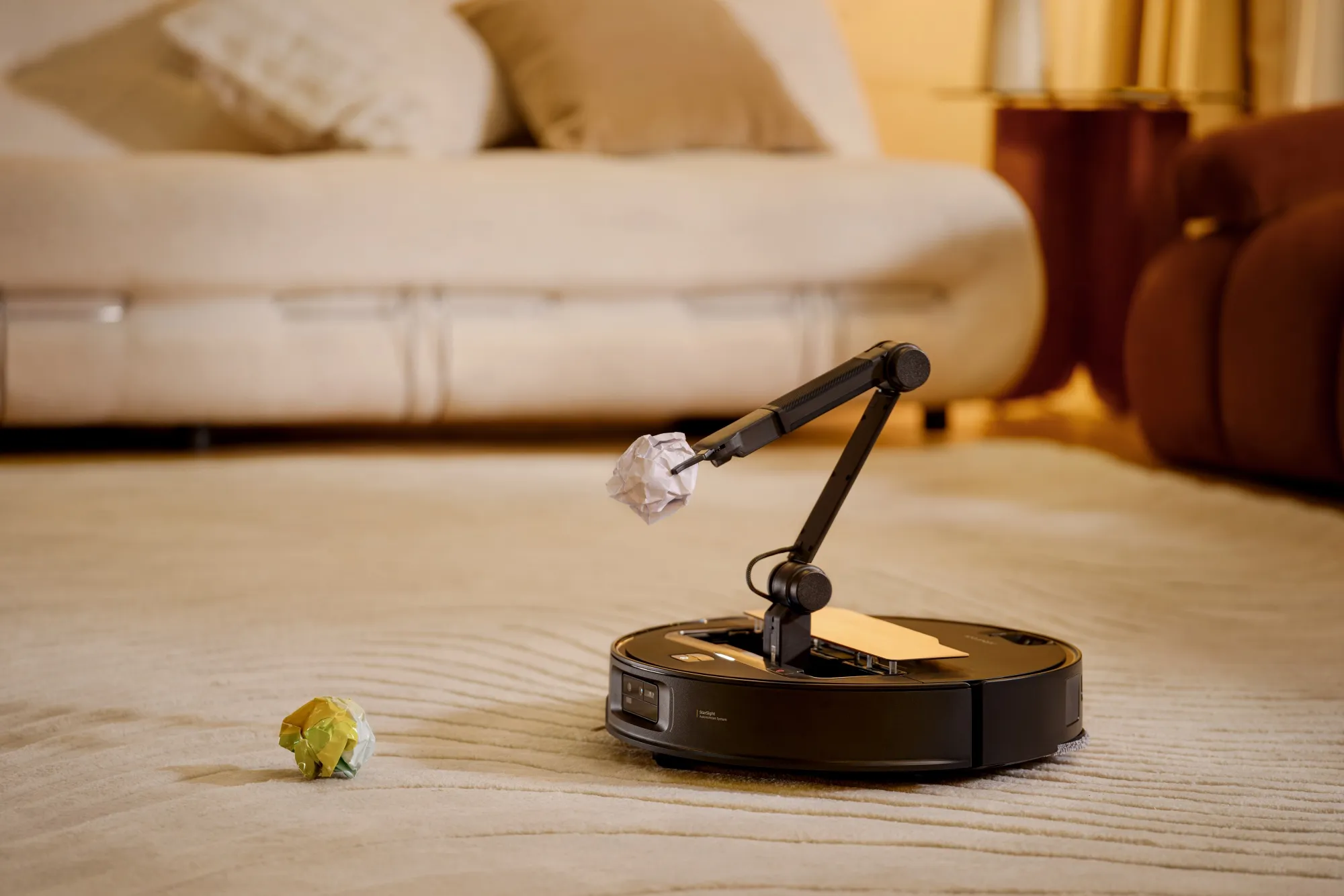 The Roborock Saros Z70 doesn't just avoid obstacles; it moves them out of the way. It can easily pick up socks, toys and slippers. ©Image Credit: Roborock