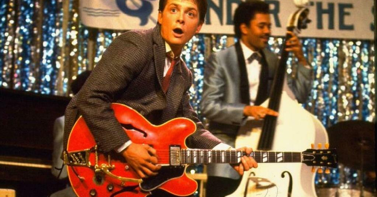Michael J. Fox as Marty McFly playing the the iconic cherry red Gibson ES-345 in Back to the Future | ©Image Credit: Amblin Entertainment