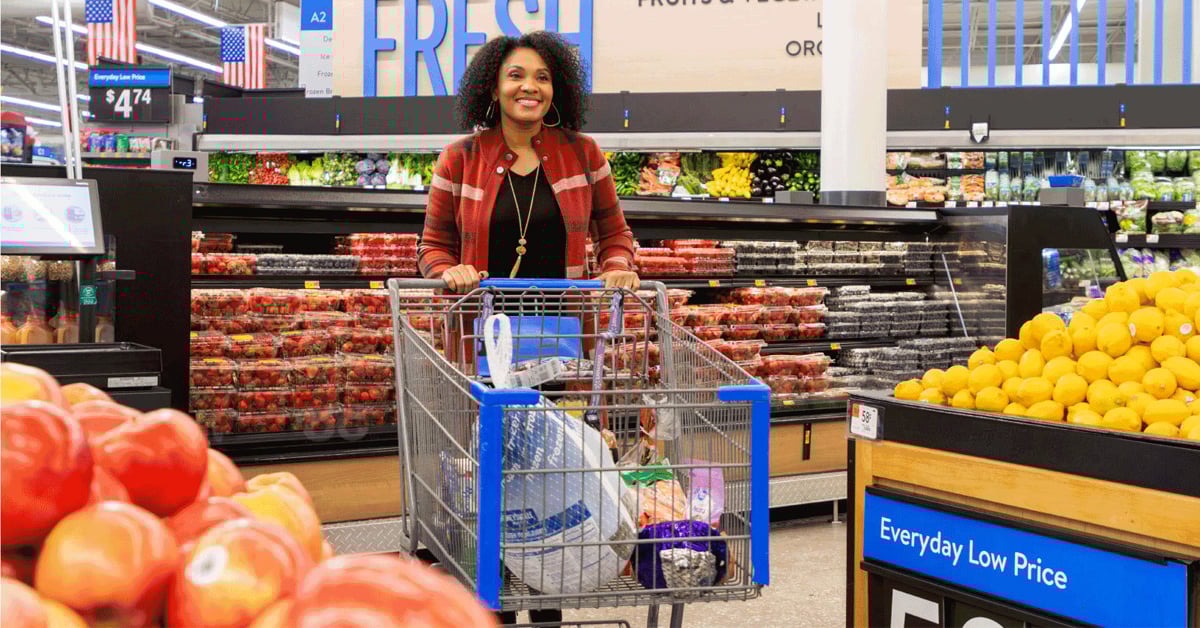 Woman shopping with a cart in Walmart | ©Image Credit: Walmart