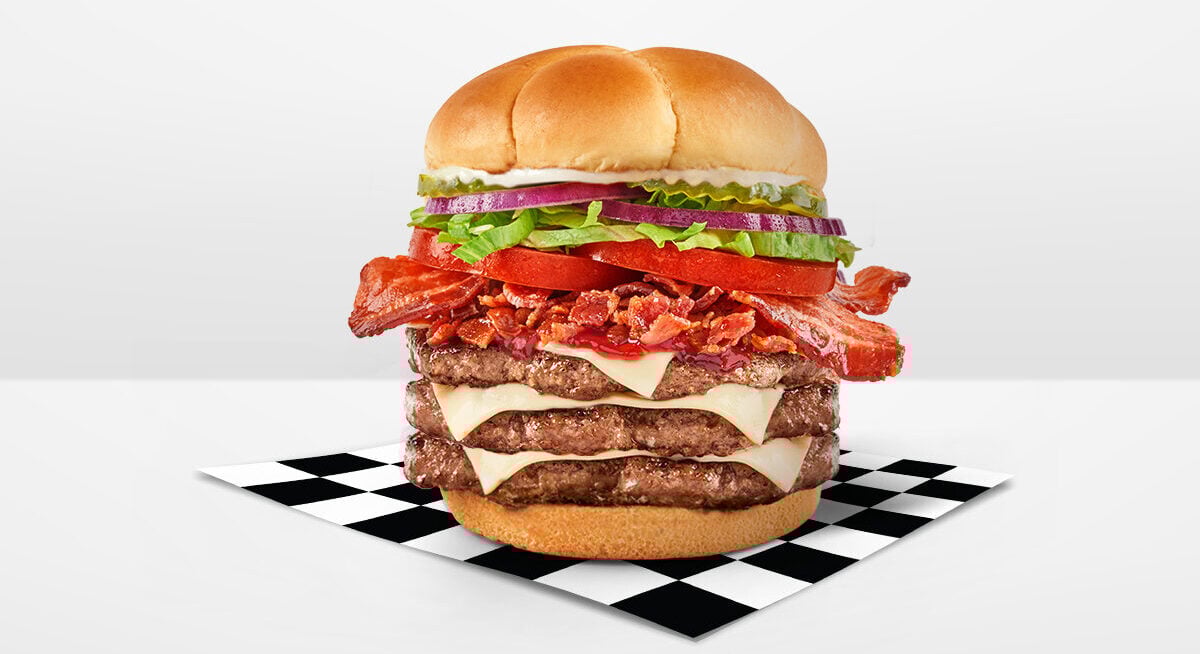The 10 Highest-Calorie Fast Food Burgers, Ranked 6 Checkers & Rally's Smoky BBQ Bacon Buford Triple