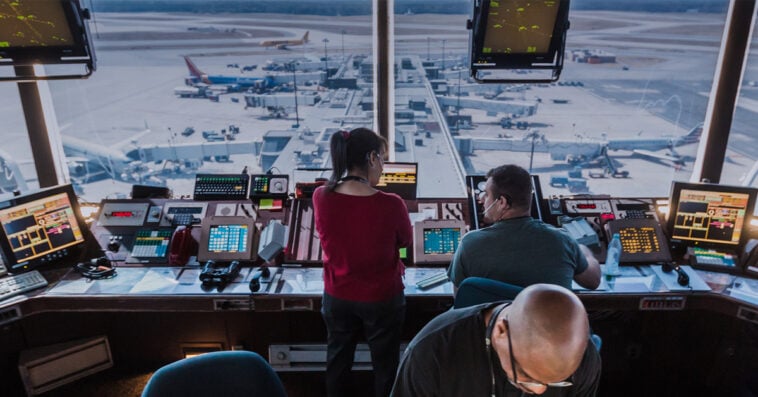 Air traffic controllers work inside a tower still reliant on aging technology—part of a nationwide system now set for a long-overdue upgrade. | ©Image Credit: FAA