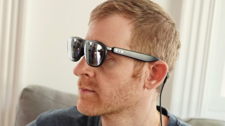 Person wearing the Rokid Max 2 AR glasses showing fit and everyday appearance | ©Image Credit: GEEKSPIN