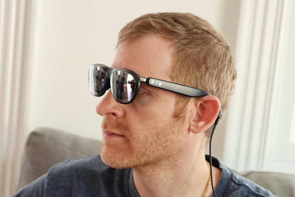 Rokid Max 2 AR Glasses Review: The Perfect First AR Glasses 3 Person wearing the Rokid Max 2 AR glasses showing fit and everyday appearance | ©Image Credit: GEEKSPIN