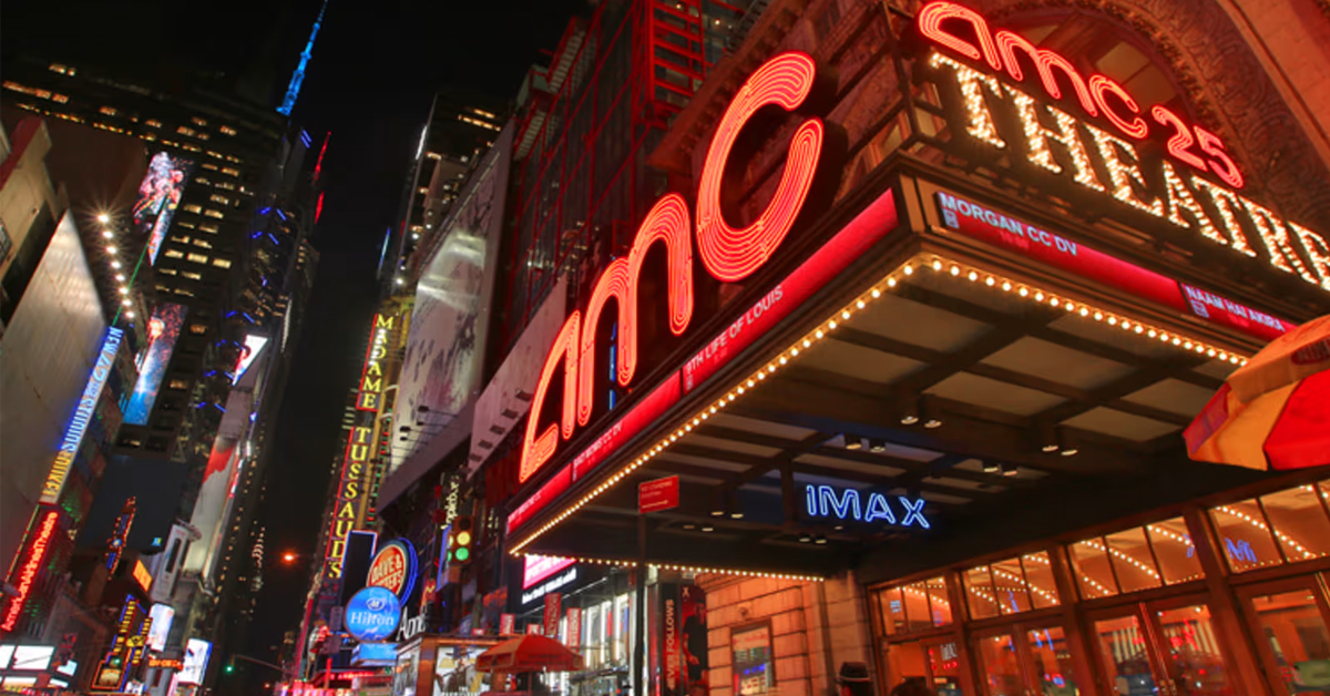 The entrance to an AMC theater where movies may now start up to 30 minutes after the listed showtime | ©Image Credit: AMC Theaters/Facebook