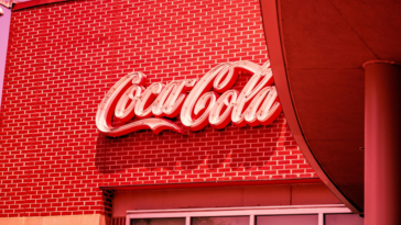 Coca Cola Glowing Sign ©Image Credit: Unsplash / Jonathan Gong