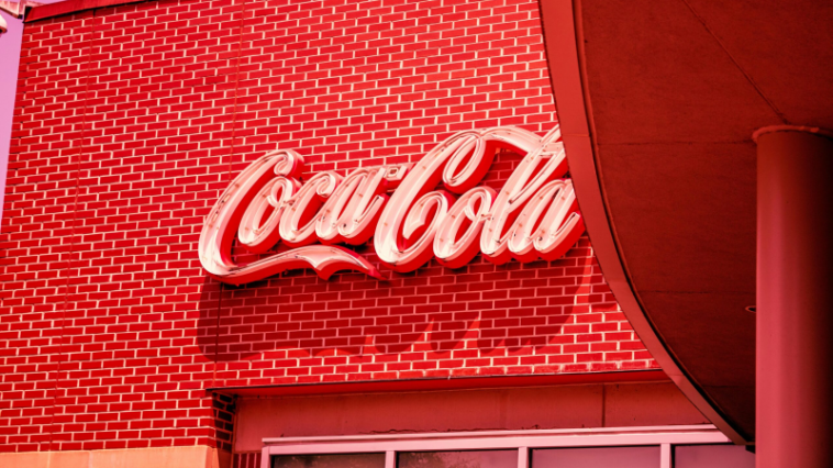 Coca Cola Glowing Sign ©Image Credit: Unsplash / Jonathan Gong