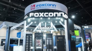 Foxconn showcases its shift from iPhones to AI at a tech convention booth | ©Image Credit: Foxconn