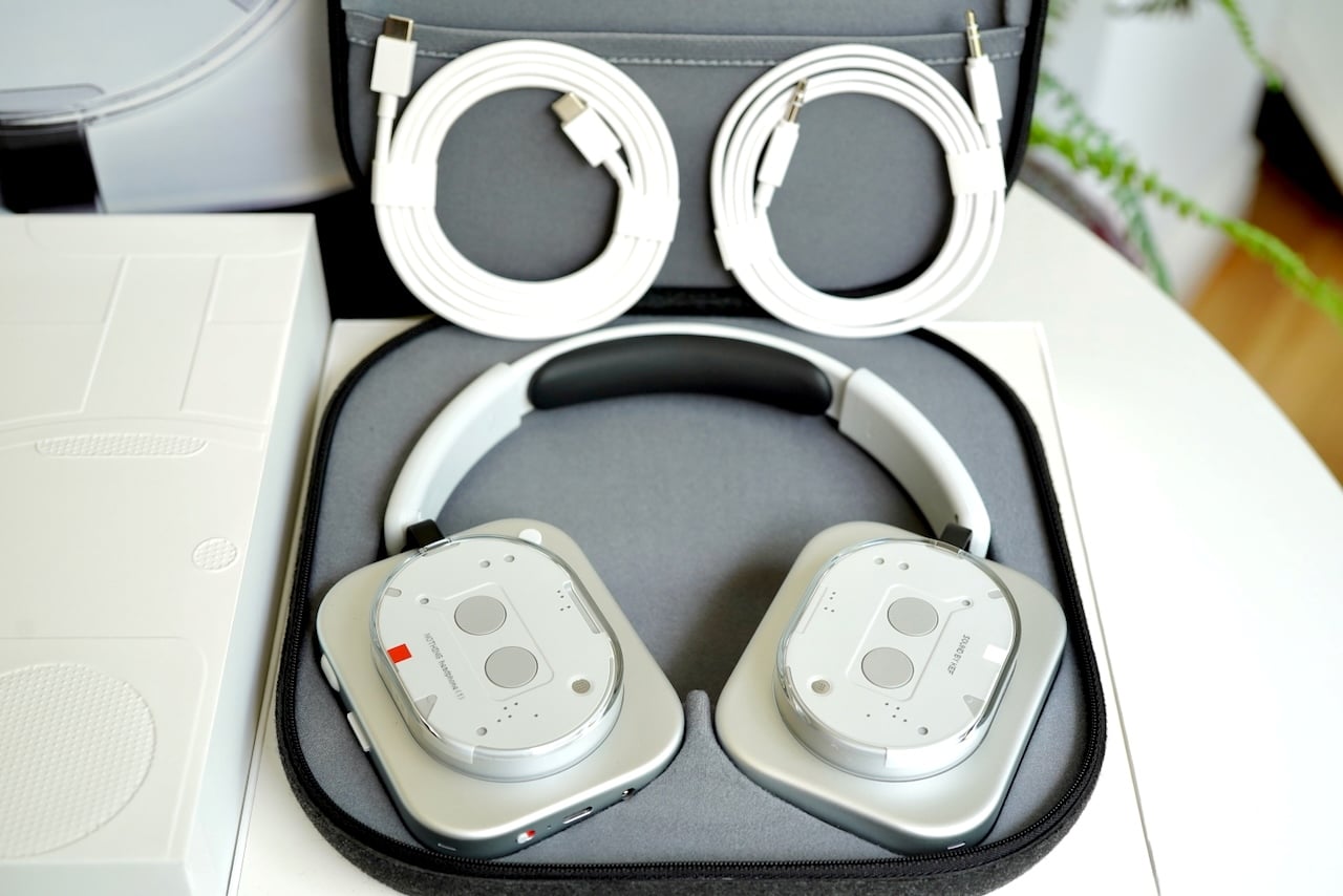 Nothing Headphone (1) Review: The glorious return of buttons and dials 10 Nothing headphones packaging contents showing the headphones, charging cable, and audio cable in travel case
