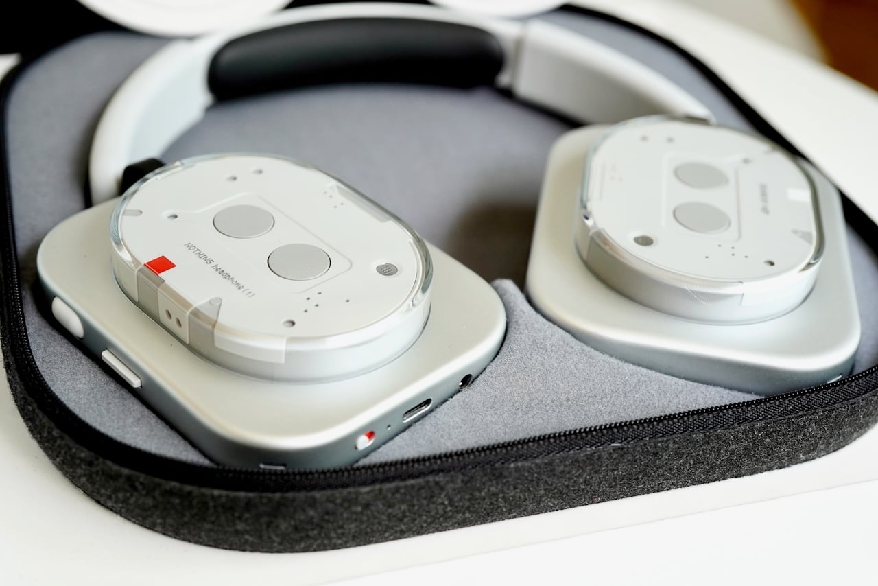 Nothing Headphone (1) Review: The glorious return of buttons and dials 7 Nothing headphones in their protective carrying case with organized cable storage compartment