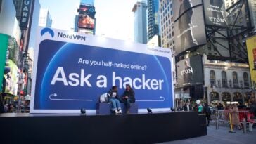 NordVPN's “Talk to a Hacker" billboard in Times Square invited passersby to come on stage ©Image Credit: GEEKSPIN