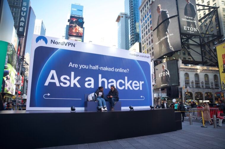 NordVPN's “Talk to a Hacker" billboard in Times Square invited passersby to come on stage ©Image Credit: GEEKSPIN