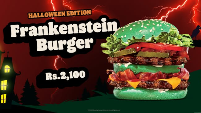 The Halloween-themed burger features a neon green bun and jalapeños ©Image Credit: Burger King Sri Lanka