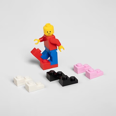 Crocs launches LEGO brick-shaped clogs for $150 3 The LEGO minifigure included with each pair of LEGO Brick Clogs | ©Image Credit: Crocs