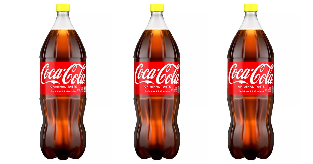 Behind the bright lid lies a 1935 secret. These yellow caps in Coca-Cola bottles represent a rich religious history and a crisp, nostalgic sugar taste. | ©Image Credit: Coca-Cola