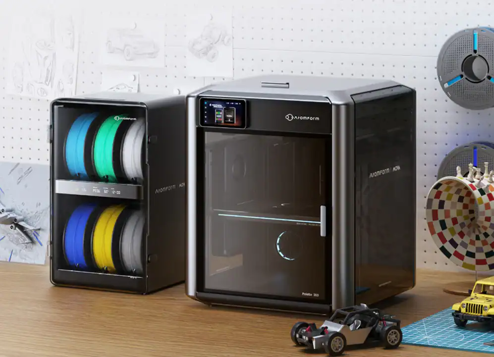 The Mova AtomForm Palette 300 3D printer with a box holding six spools of filament - up to six boxes can be connected to the printer at once ©Image Credit: Mova