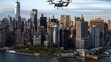 Joby electric air taxi cruises over the Manhattan skyline during its April 2026 test campaign. The company aims to launch commercial service from JFK to the city’s heliports by late 2026. ©Image Credit: Joby Aviation
