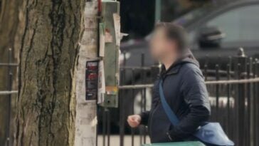 Man Pulling Tab from Hidden World Cup Flyer ©Image Credit: Total Wireless