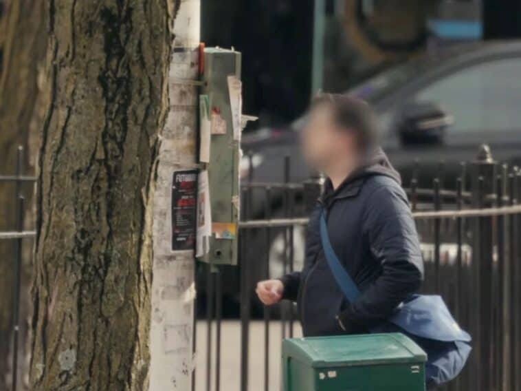 Man Pulling Tab from Hidden World Cup Flyer ©Image Credit: Total Wireless