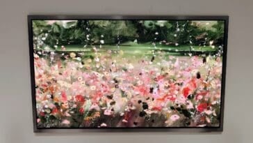 Samsung’s S95H OLED features a flush-to-wall FloatLayer aesthetic and Art Store access, blurring the line between a high-end gaming monitor and gallery art. ©Image Credit: GEEKSPIN