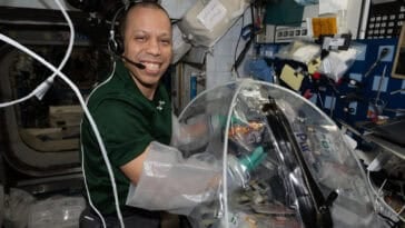 NASA astronaut Chris Williams sets up cancer research experiment aboard the ISS to study drug behavior in zero gravity conditions in space. | ©Image Credit: NASA
