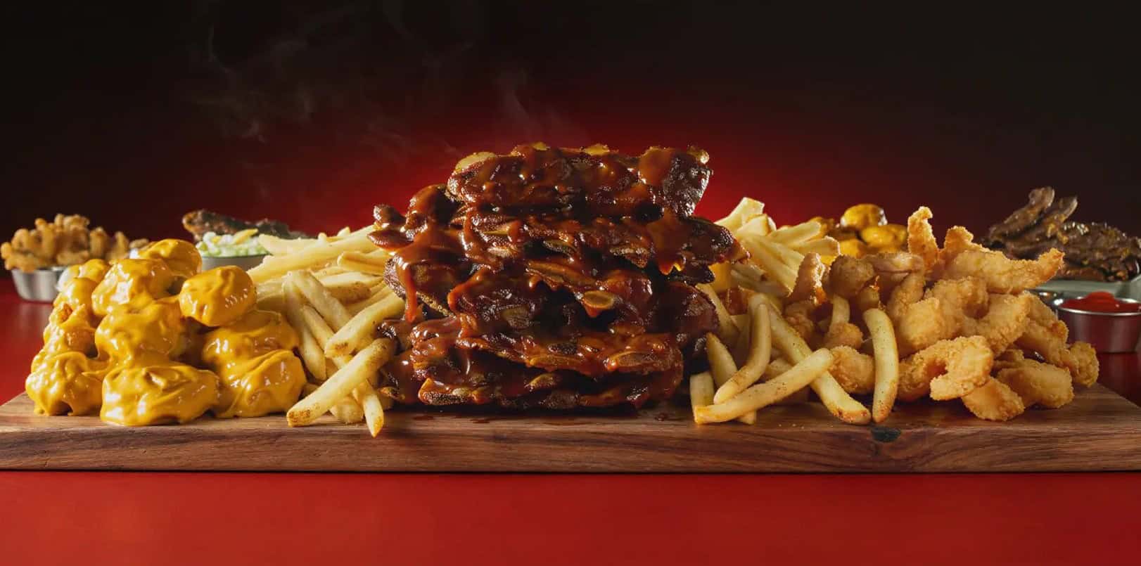 Applebee's All You Can Eat' deal features unlimited servings of Boneless Wings, Signature Riblets, Double Crunch Shrimp, and endless fries ©Image Credit: Applebee's