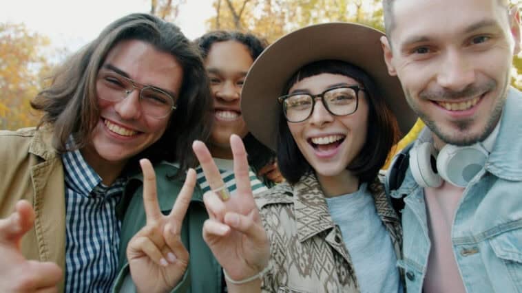 Flashing a peace sign? Experts warn that AI can now steal your fingerprints from high-res selfies. | ©Image Credit: Vitaly Gariev
