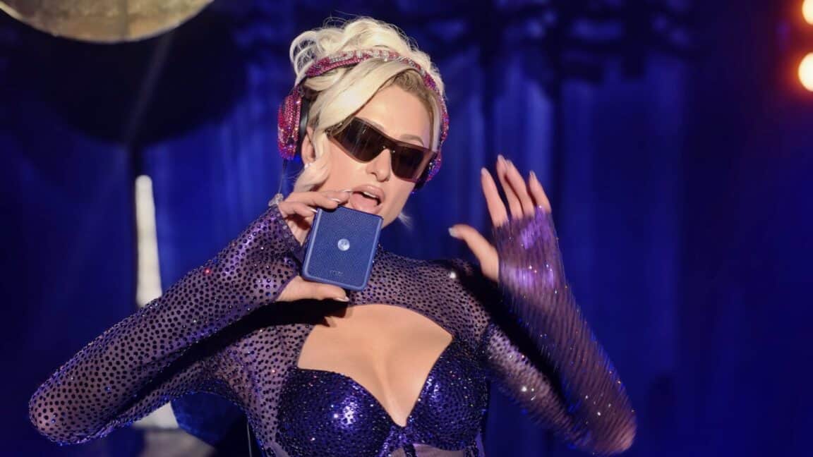 Paris Hilton DJs while promoting the 2026 Motorola Razr Ultra in Orient Blue at the 2026 Razr series launch event. | Image Credit: GEEKSPIN