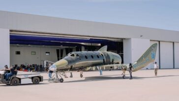 Virgin Galactic’s first next-generation Delta-class spaceship is towed into the Test-and-Launch hangar at its Phoenix facility | ©Image Credit: Virgin Galactic