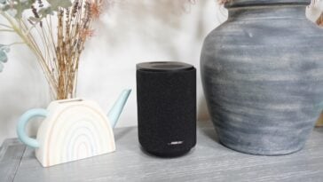 The Bose Lifestyle Ultra Speaker looks portable, but it is not: it is tethered to the wall, and the upside is that it sounds more powerful, fuller, and more substantial than a typical battery-powered speaker this size | ©Image Credit: GEEKSPIN