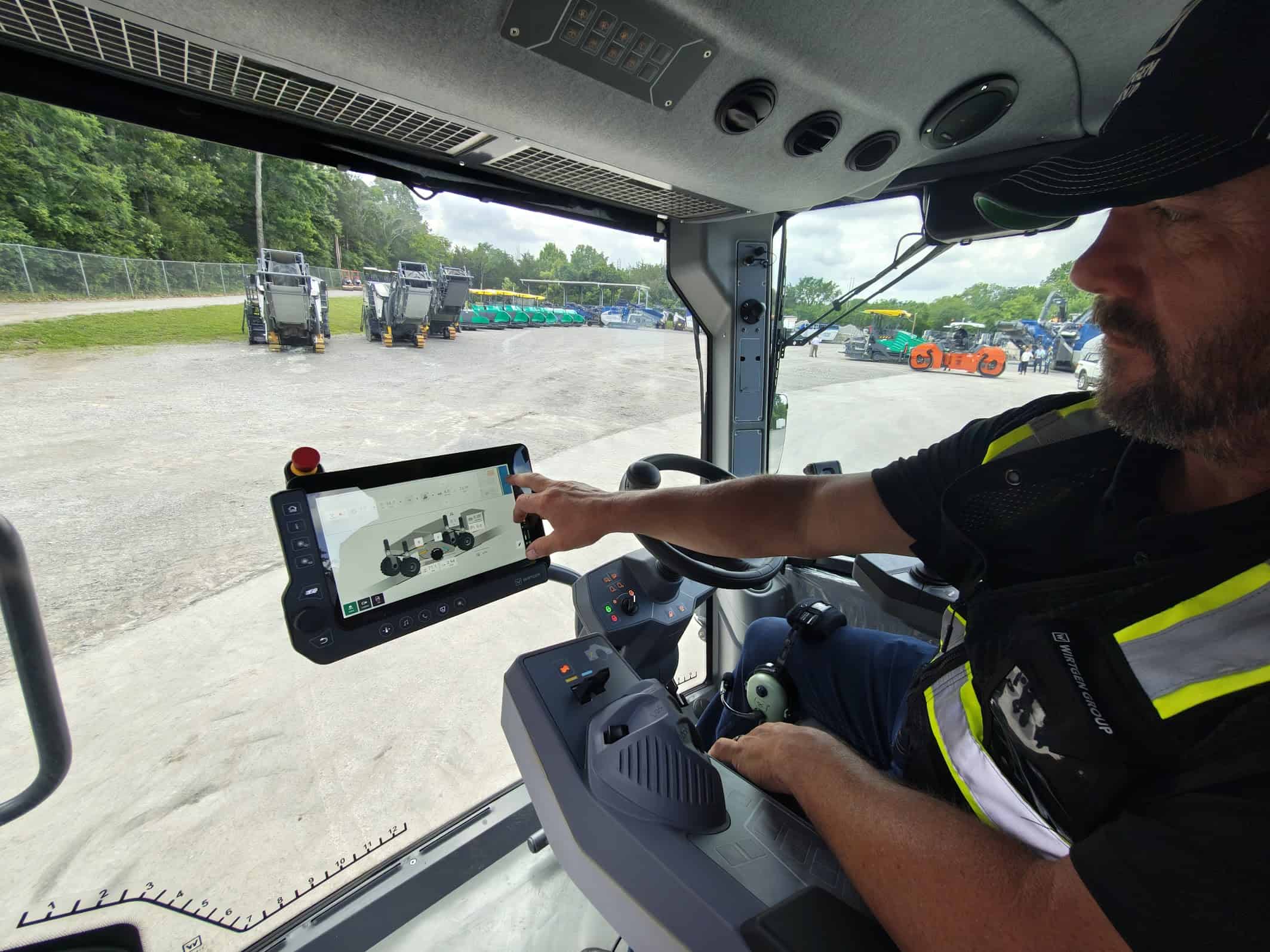 How new smart machinery is solving the road worker shortage 2 A Wirtgen operator works the touchscreen that tracks the machine's performance in real time. ©Image Credit: GEEKSPIN