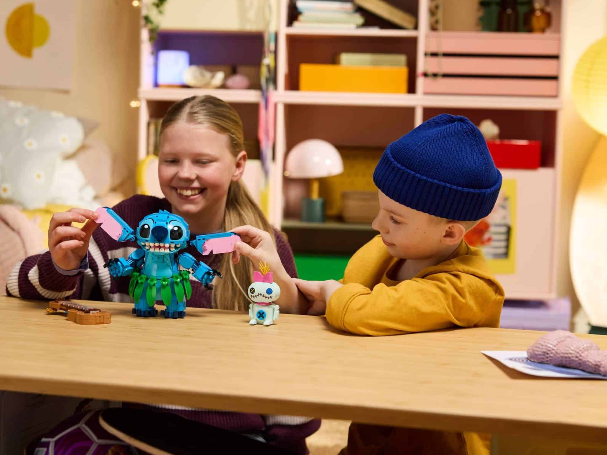 LEGO's new Stitch and Scrump set is 713 pieces of cuteness and chaos 2 Kids Building LEGO Disney Stitch and Scrump Set ©Image Credit: LEGO