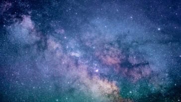 Scientists discover a sugar molecule in a massive cloud of gas and dust near the center of the Milky Way, offering clues about life’s origins in the universe. | ©Image Credit: Jeremy Thomas / Unsplash