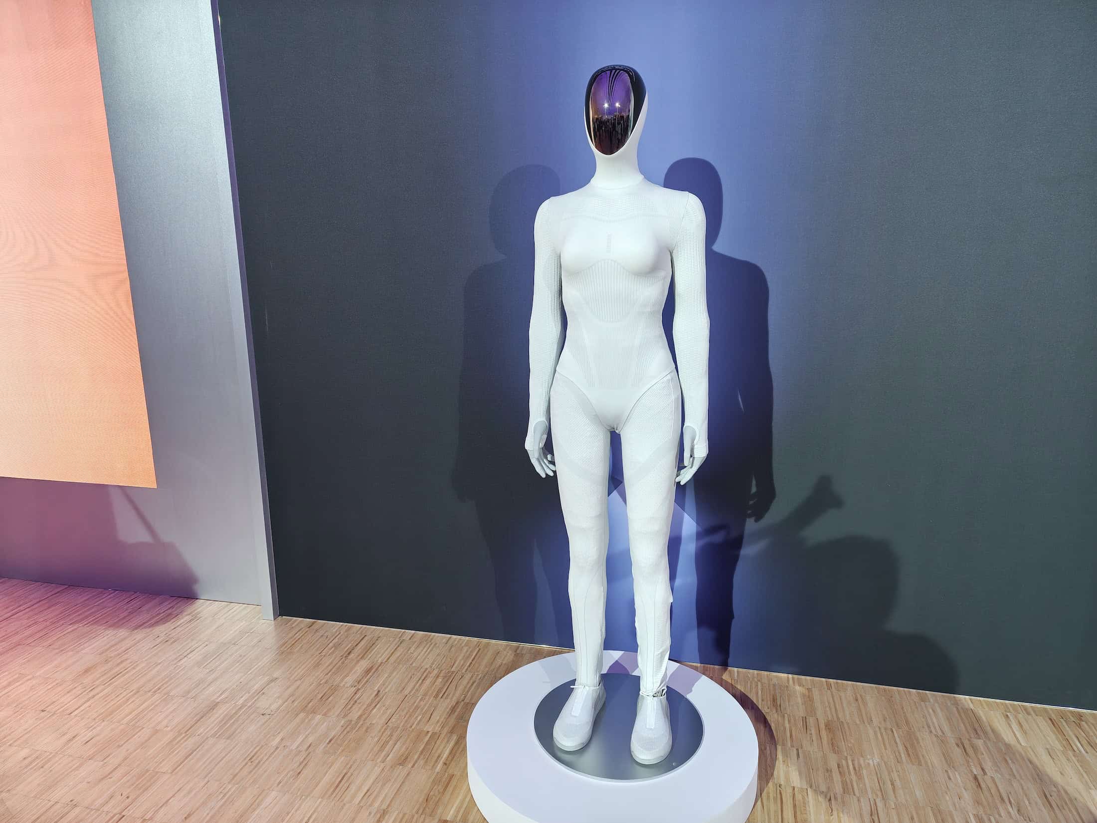 XPENG unveils new L03 EV, flying cars, and humanoid robots 5 Powered by XPENG’s in-house Turing AI chips, this Physical AI humanoid robot is slated for a global rollout starting in 2027. © Image Credit: GEEKSPIN