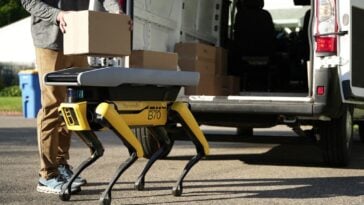 Boston Dynamics' Spot robot dog is teaming up with human drivers to deliver your packages. ©Image Credit: Boston Dynamics