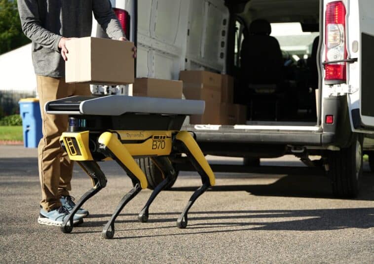 Robot dogs could soon be dropping packages at your door 1 Boston Dynamics' Spot robot dog is teaming up with human drivers to deliver your packages. ©Image Credit: Boston Dynamics
