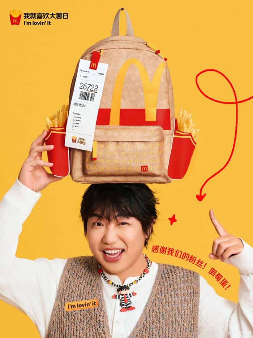 McDonald’s releases backpack designed to hold French fries 2 Daomeidan holding the McDonald's Big Fries Backpack | ©Image Credit: McDonald's