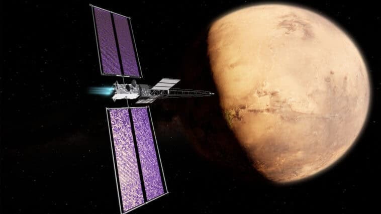 Artist concept of NASA’s SR-1 Freedom spacecraft utilizing a nuclear electric propulsion system to journey toward Mars in late 2028. | ©Image Credit: NASA