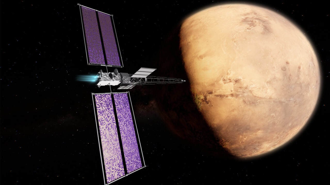 Artist concept of NASA’s SR-1 Freedom spacecraft utilizing a nuclear electric propulsion system to journey toward Mars in late 2028. | ©Image Credit: NASA
