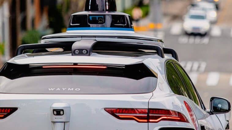 Human drivers say Waymo’s self-driving cars are taking away their most profitable rides and are pushing for a "robotaxi impact fee" as autonomous fleets cut into rideshare pay. ©Image Credit: Facebook / Waymo